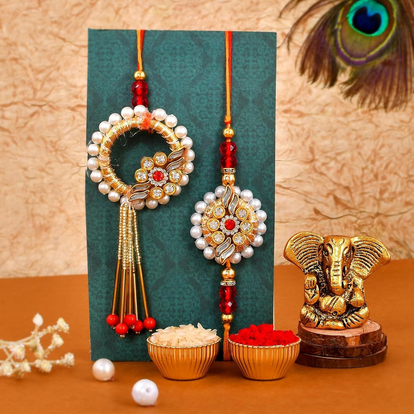 VMMPL Premium Bhaiya Bhabhi Rakhi Gift Combo with Ganesha Idol ā Kundan Rakhi, Floral Lumba, Greeting Card & Tilak Set | Raksha Bandhan Special